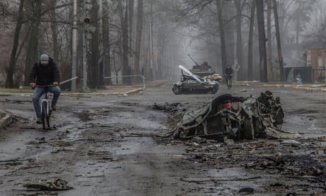 ‘It is a war crime’: two young boys among neighbours shot dead during attempted evacuation