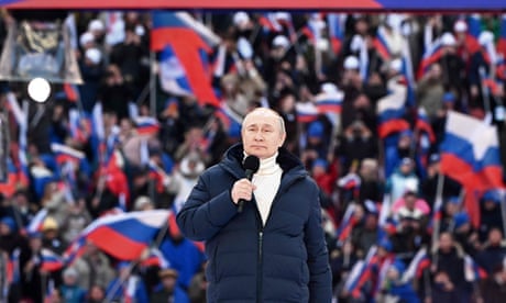 Putin praises Russian ‘unity’ at rally as glitch cuts state TV broadcast