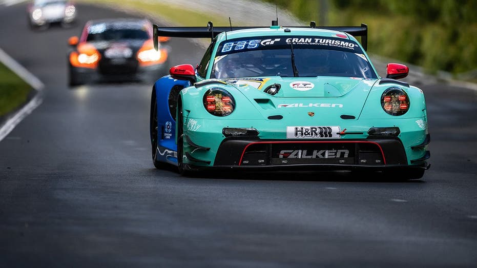Stranded driver narrowly avoids being hit on track in scary incident in qualifying for 24-hour race in Germany