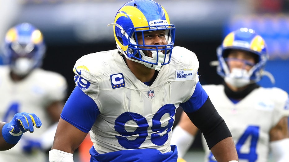 'We back': Aaron Donald returns to the Rams and a defense now loaded with Myles Garrett and others